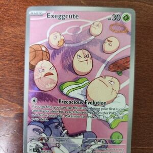 Pokemon Exeggcute Card - Pink and Green